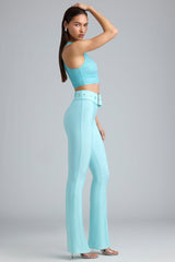 Metallic Belted Mid-Rise Flared Trousers in Ice Blue