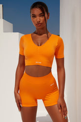 Gradient Scoop Neck Ruched Crop Top in Orange