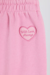 Mid-Rise Wide-Leg Joggers in Baby Pink