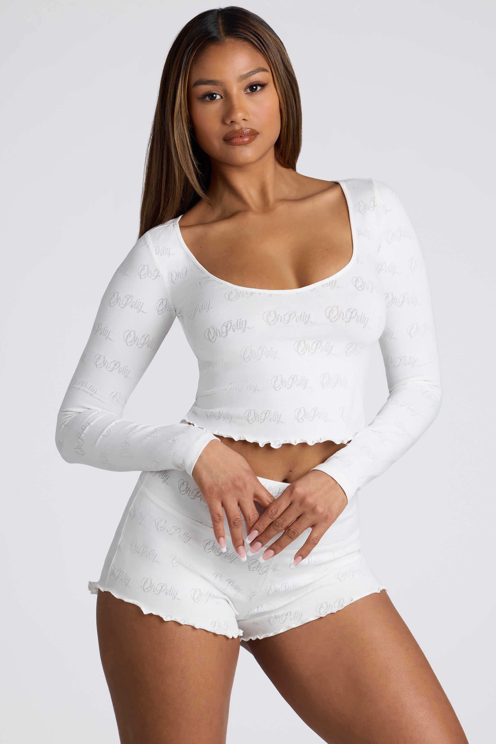 Mid Rise Pointelle Mini Shorts in White