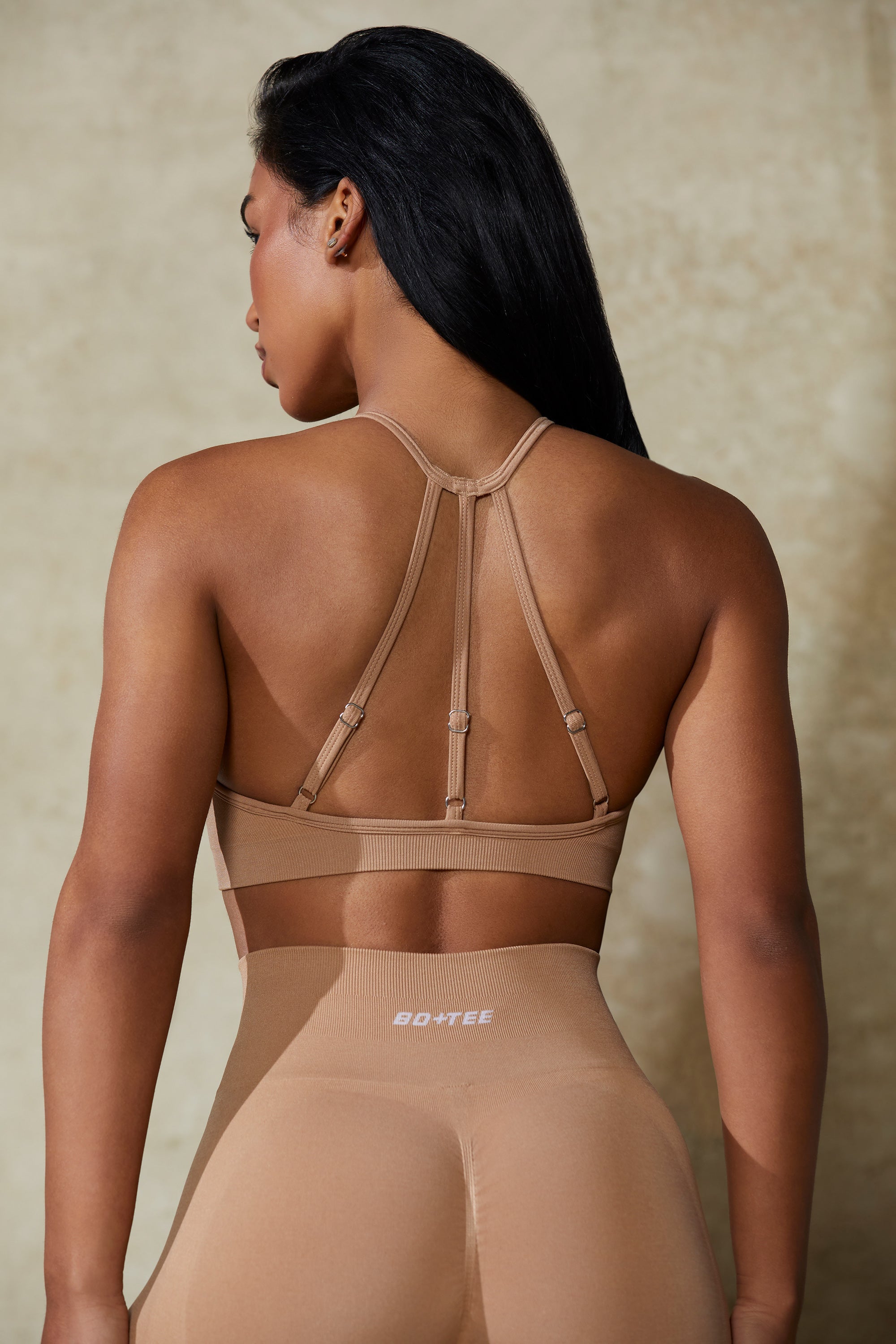 High Neck Open Back Define Luxe Sports Bra in Warm Taupe