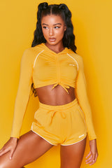 On Track Mini Runner Shorts in Orange