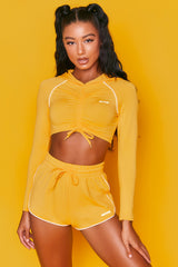 On Track Mini Runner Shorts in Orange