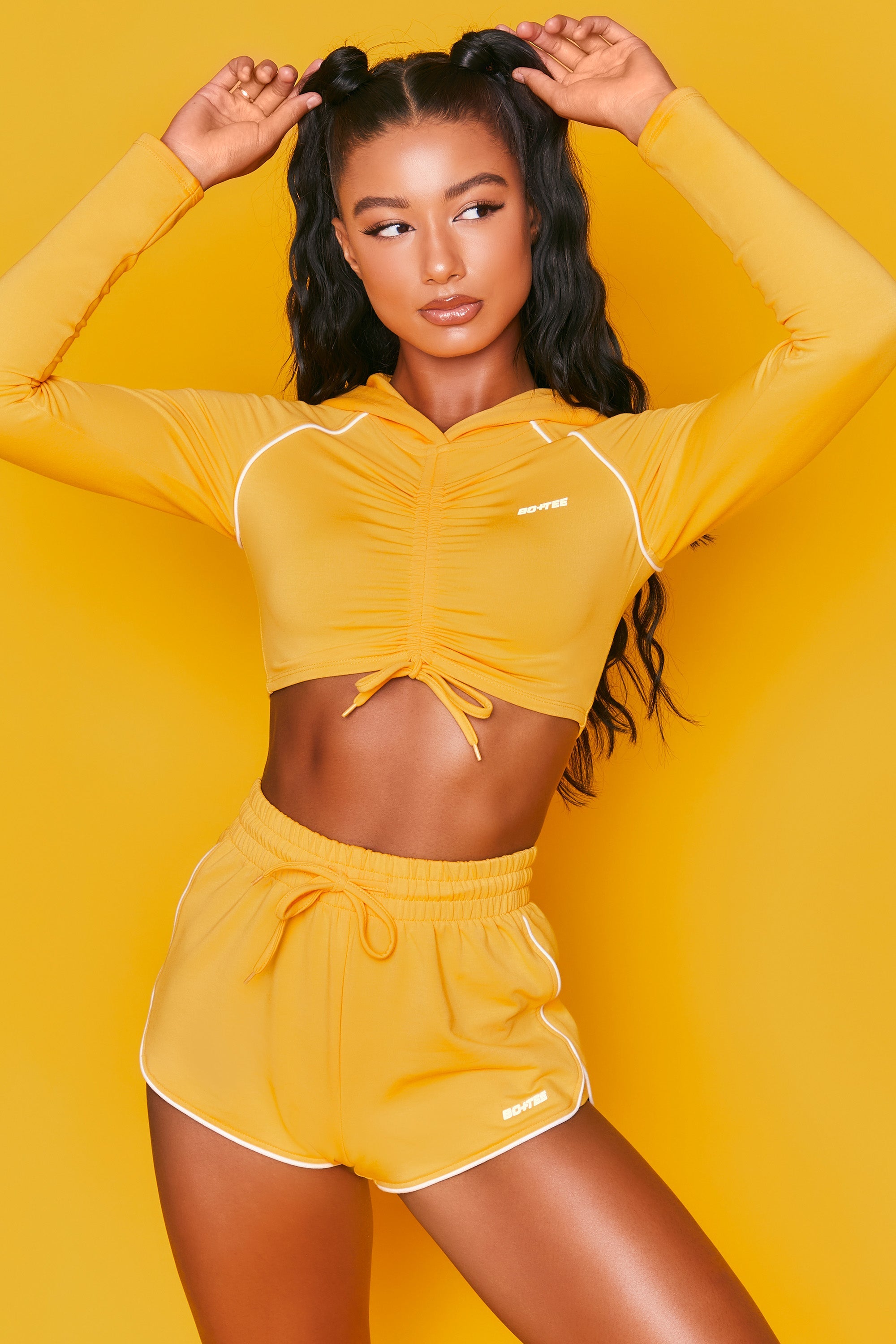 On Track Mini Runner Shorts in Orange