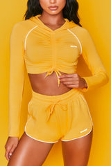 On Track Mini Runner Shorts in Orange