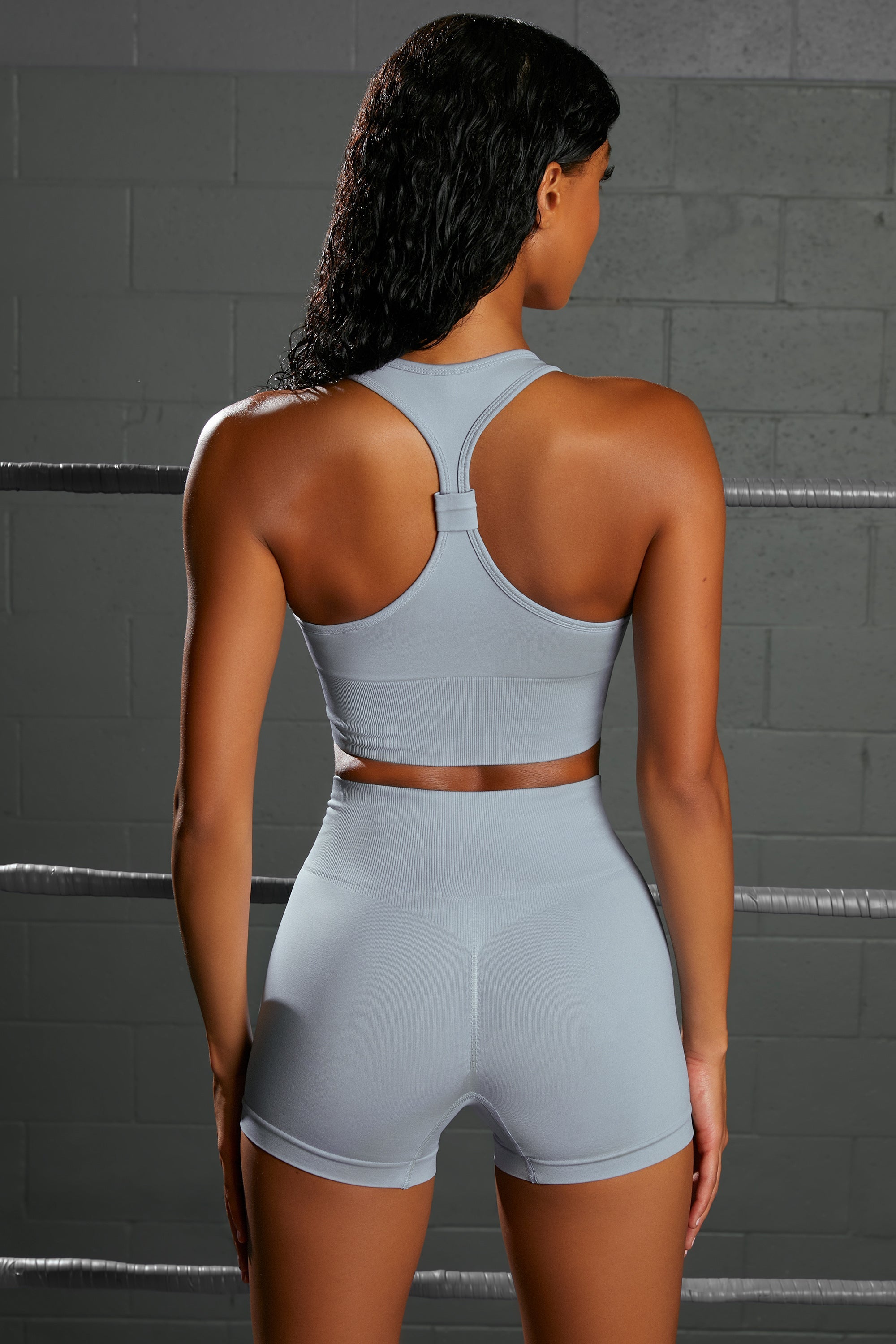 Overhaul Racer Knot Back Seamless Crop Top in Blue