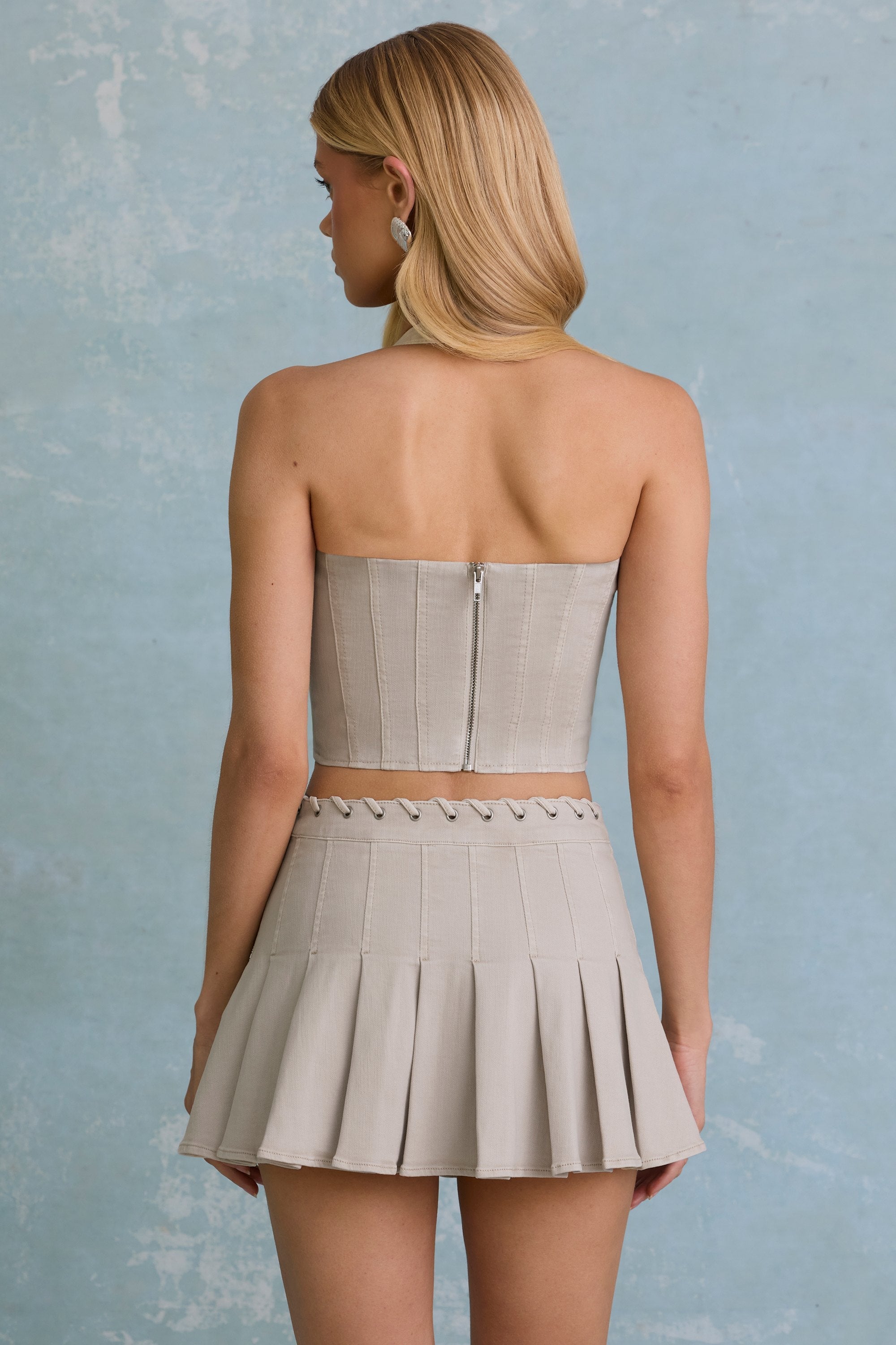 Low-Rise Pleated Mini Skirt in Ecru