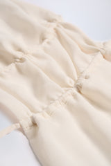 Cut-Out Semi-Sheer Ruched Halterneck Crop Top in Ivory