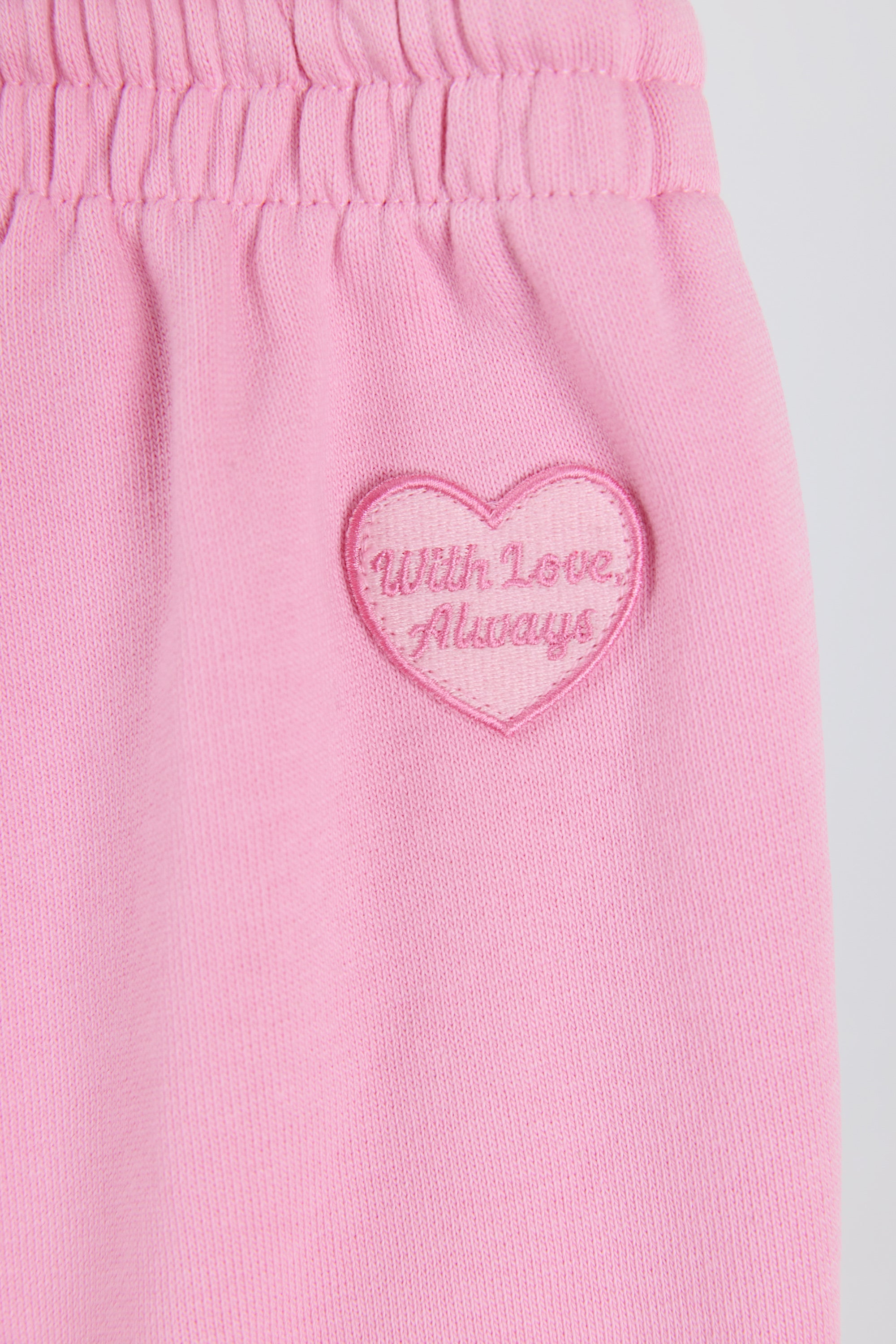 Mid-Rise Wide-Leg Joggers in Baby Pink