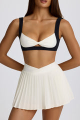 Soft Active Crossover Pleated Mini Skort in Ivory